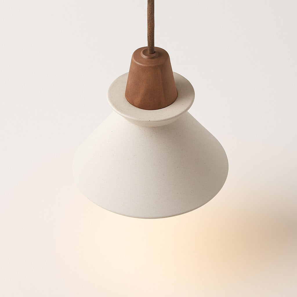 Suspension conique en ciment clair et bois foncé, design épuré et lumineux, idéale comme abat-jour moderne et naturel.