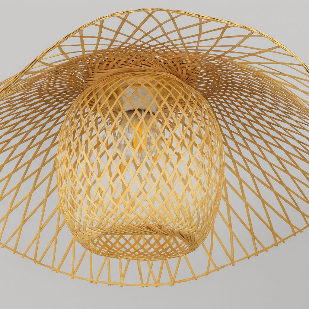 Abat-jour rotin design en suspension, tressage ajouré pour une lumière naturelle et décorative.