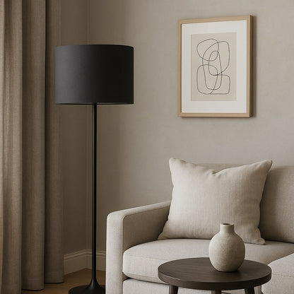 Lampe sur pied avec abat-jour tambour lin gris, design épuré pour salon cosy et contemporain.