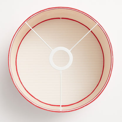 Vue intérieure d’un abat-jour rayé rouge et blanc à trois branches métalliques, compatible lampadaire.